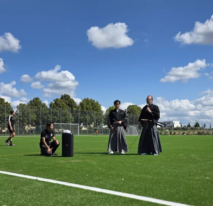 a group of men on a football field